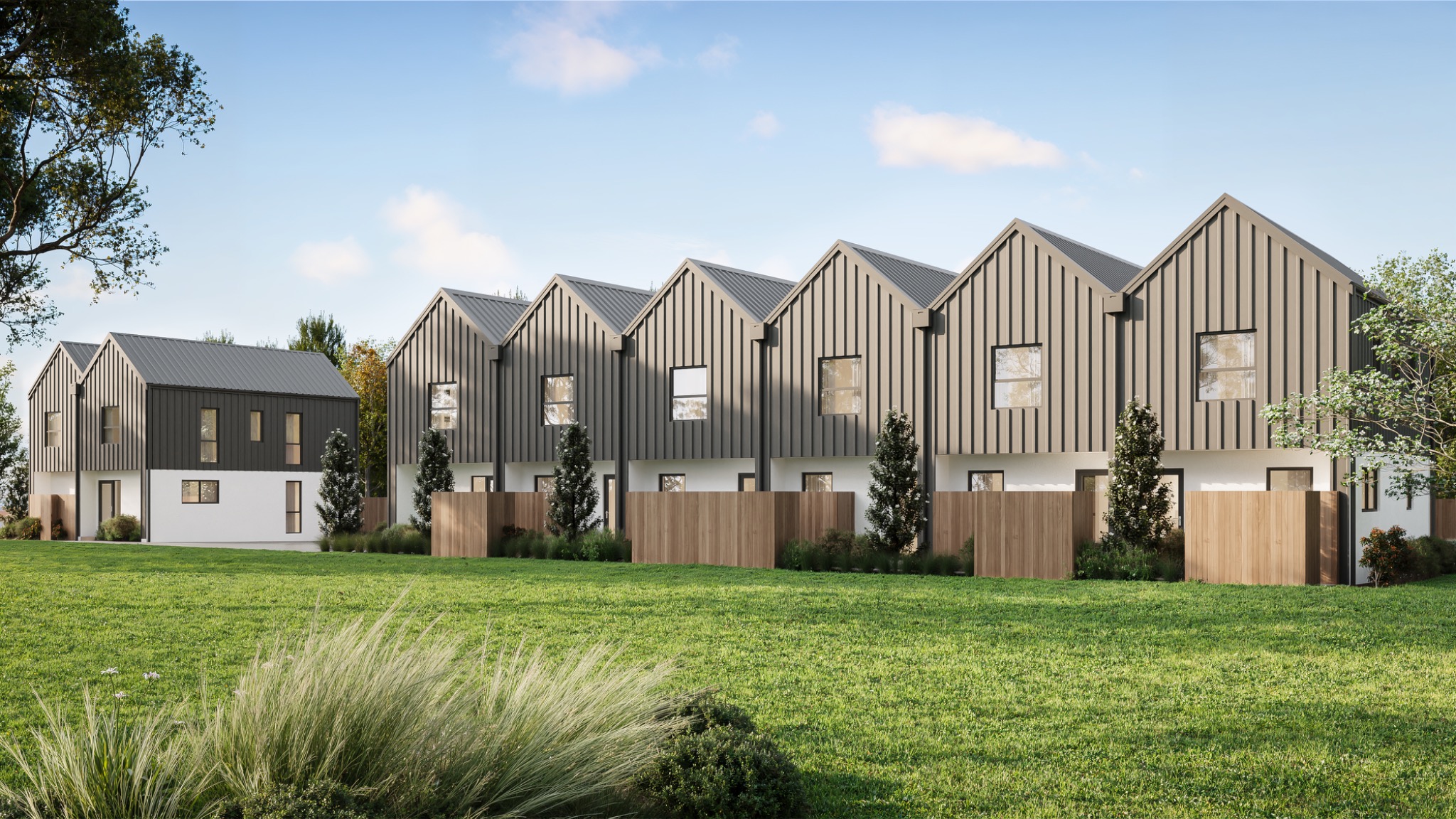 High-resolution townhouse development visualisation for 3 Pannell Avenue, Wainoni, Christchurch, showing the repeating gabled forms, dark metal cladding, private outdoor areas and integrated landscape design. Photorealistic exterior 3D render of contemporary gabled townhouses at 3 Pannell Avenue, Wainoni, Christchurch, with dark vertical cladding, timber fencing and landscaped open space